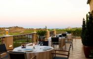 View Monte Rei Golf  Country Club's lovely restaurant terrace in astounding Algarve.