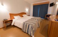 View Hotel do Mar's beautiful double bedroom within fantastic Lisbon.