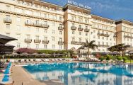 View Palacio Estoril Hotel's picturesque outdoor pool situated in fantastic Lisbon.