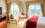 The Praia D'el Rey Marriott Golf  Beach Resort's picturesque double bedroom in pleasing Lisbon.