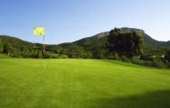 View Andratx Golf Course - Camp de Mar's scenic golf course situated in vibrant Mallorca.
