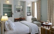 The Vidago Palace Hotel's picturesque double bedroom within stunning Porto.