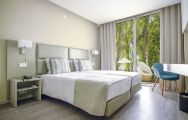 The Maria Nova Lounge Hotel's picturesque double bedroom within gorgeous Algarve.