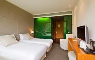 View DoubleTree by Hilton La Mola Hotel's picturesque twin room within dazzling Costa Brava.