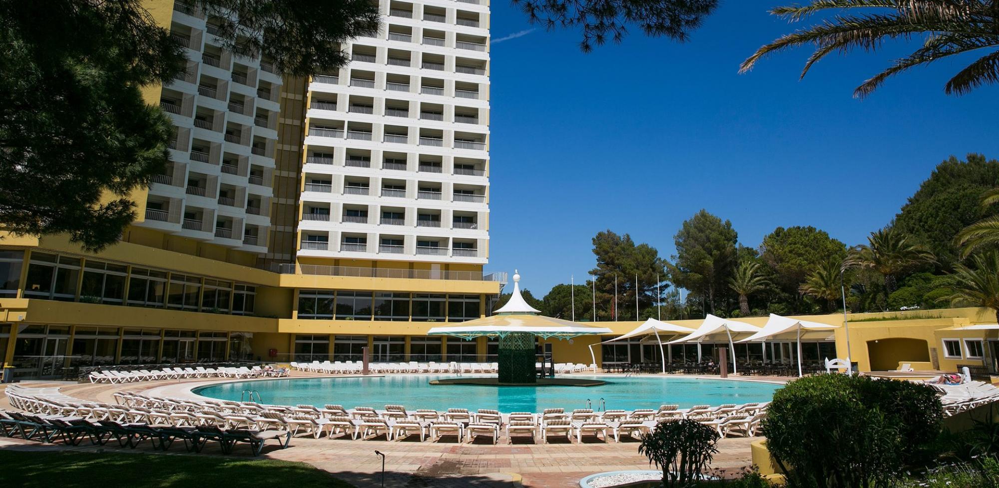 The Pestana Delfim Hotel's impressive outdoor pool situated in vibrant Algarve.