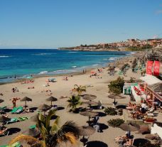The Cleopatra Palace Hotel's impressive Playa de Las Americas beach situated in vibrant Tenerife.