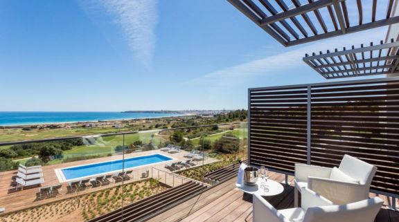 Onyria Palmares Beach House Hotel's picturesque balcony view within vibrant Algarve.
