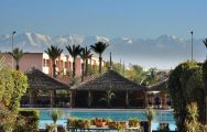 The Kenzi Menara Palace's picturesque poolside seating in incredible Morocco.