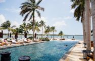 The Four Seasons Resort Mauritius at Anahita's scenic sea view pool in fantastic Mauritius.
