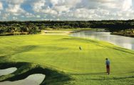View Hard Rock Golf Club at Cana Bay's picturesque golf course within vibrant Dominican Republic.