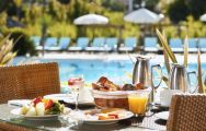 View Wyndham Grand Algarve's scenic poolside seating in impressive Algarve.