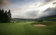 View The Montgomerie Course at Celtic Manor Resort's picturesque golf course within dazzling Wales.