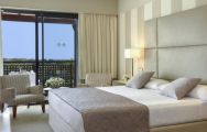 The Precise Resort El Rompido's picturesque double bedroom in stunning Costa de la Luz.