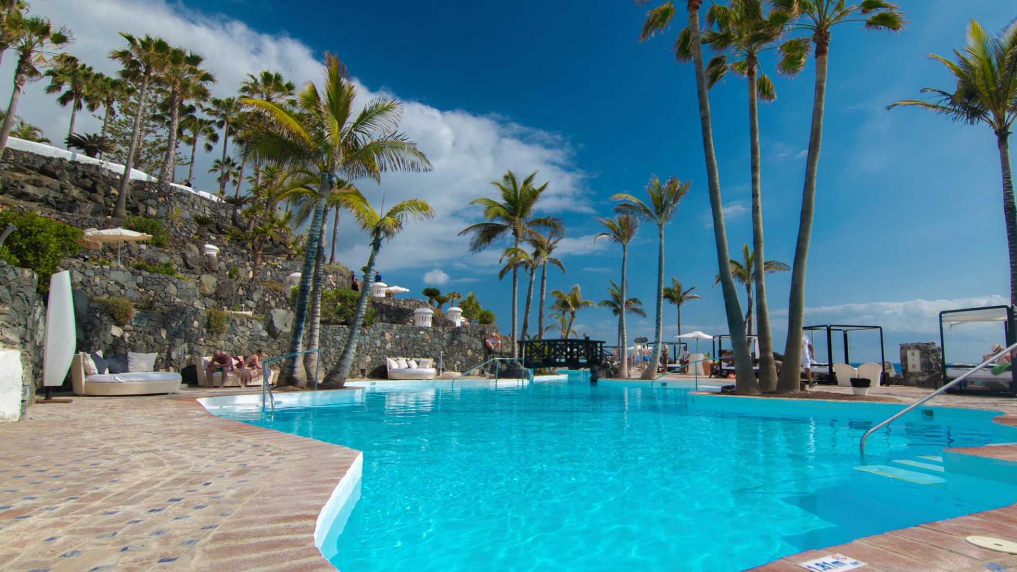 View Hotel Jardin Tropical's lovely main pool situated in brilliant Tenerife.