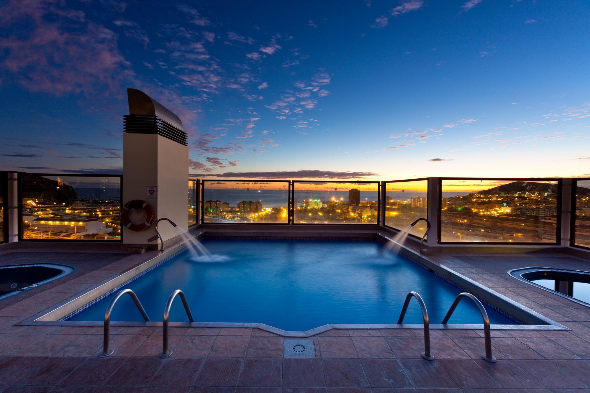 View Paradise Park Hotel's impressive rooftop pool situated in brilliant Tenerife.