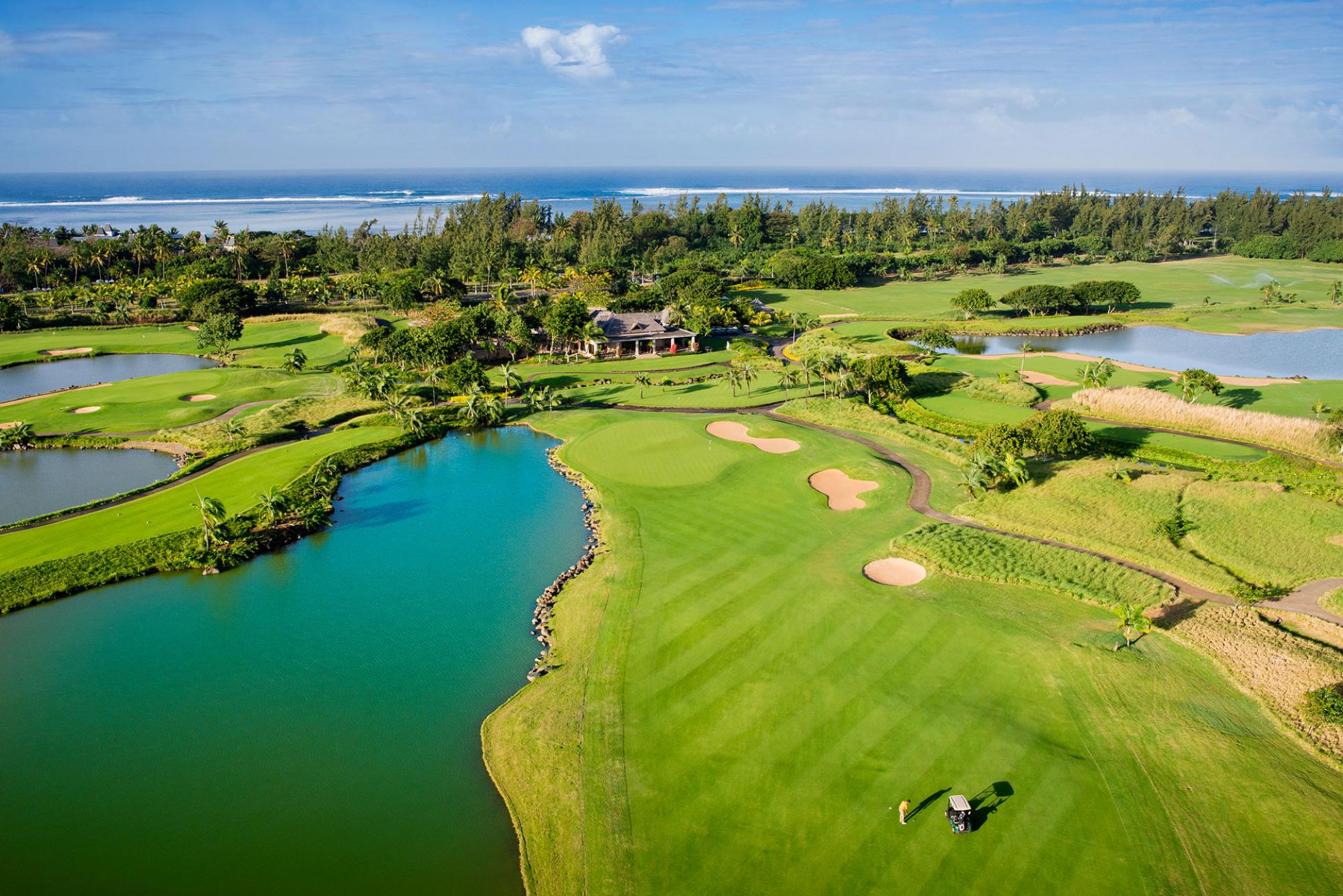 View The Heritage Golf Club's impressive 18th hole in impressive Mauritius.