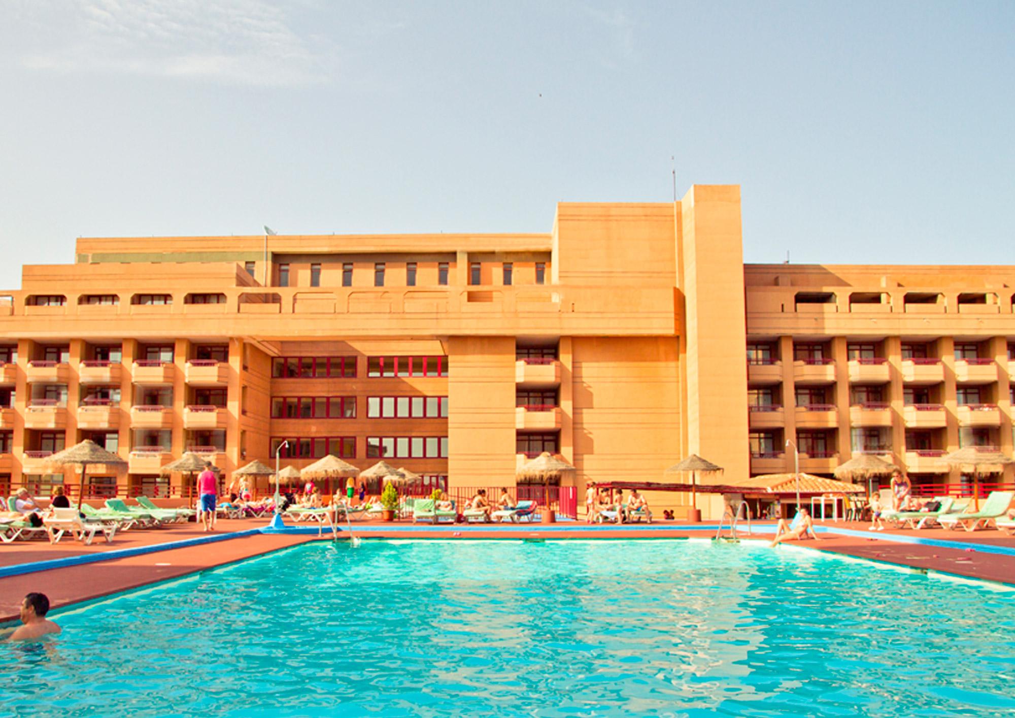 View Las Palmeras Hotel's beautiful outdoor pool within stunning Costa Del Sol.