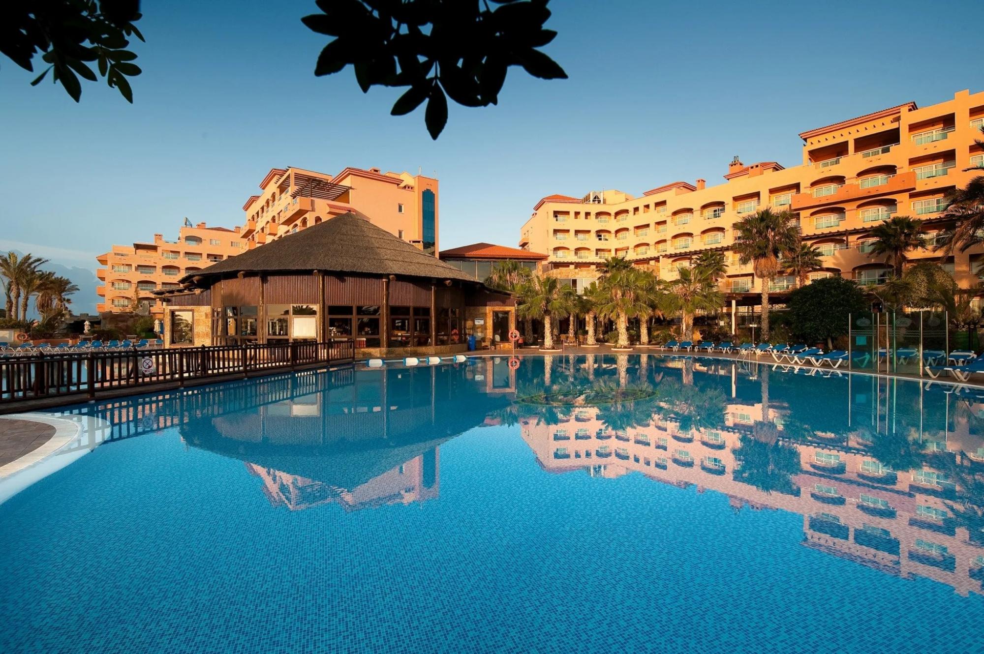 The Elba Sara Beach  Golf Resort's picturesque outdoor pool in pleasing Fuerteventura.