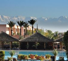 The Kenzi Menara Palace's picturesque poolside seating in incredible Morocco.