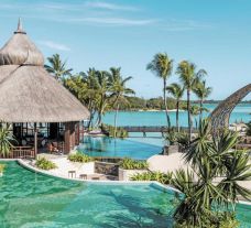 The Shangri La Le Touessrok Resort  Spa's scenic outdoor pool in brilliant Mauritius.
