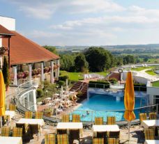 View Hotel Maximilian's picturesque outdoor pool within amazing Bavaria.