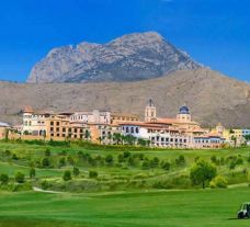 a view of the Villaitana golf course with the hotel in the background