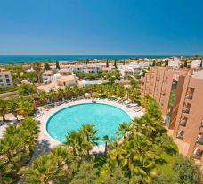 View Sao Rafael Suites Hotel's picturesque main pool within striking Algarve.