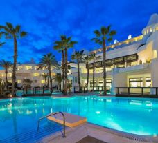 The H10 Estepona Palace's scenic outdoor pool situated in marvelous Costa Del Sol.