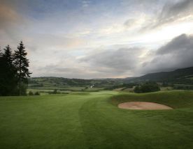 View The Montgomerie Course at Celtic Manor Resort's picturesque golf course within dazzling Wales.