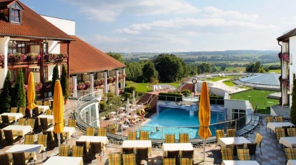 View Hotel Maximilian's picturesque outdoor pool within amazing Bavaria.