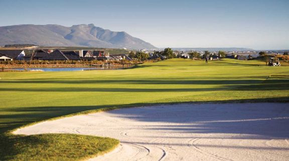 The Arabella Golf Club's picturesque golf course situated in impressive South Africa.